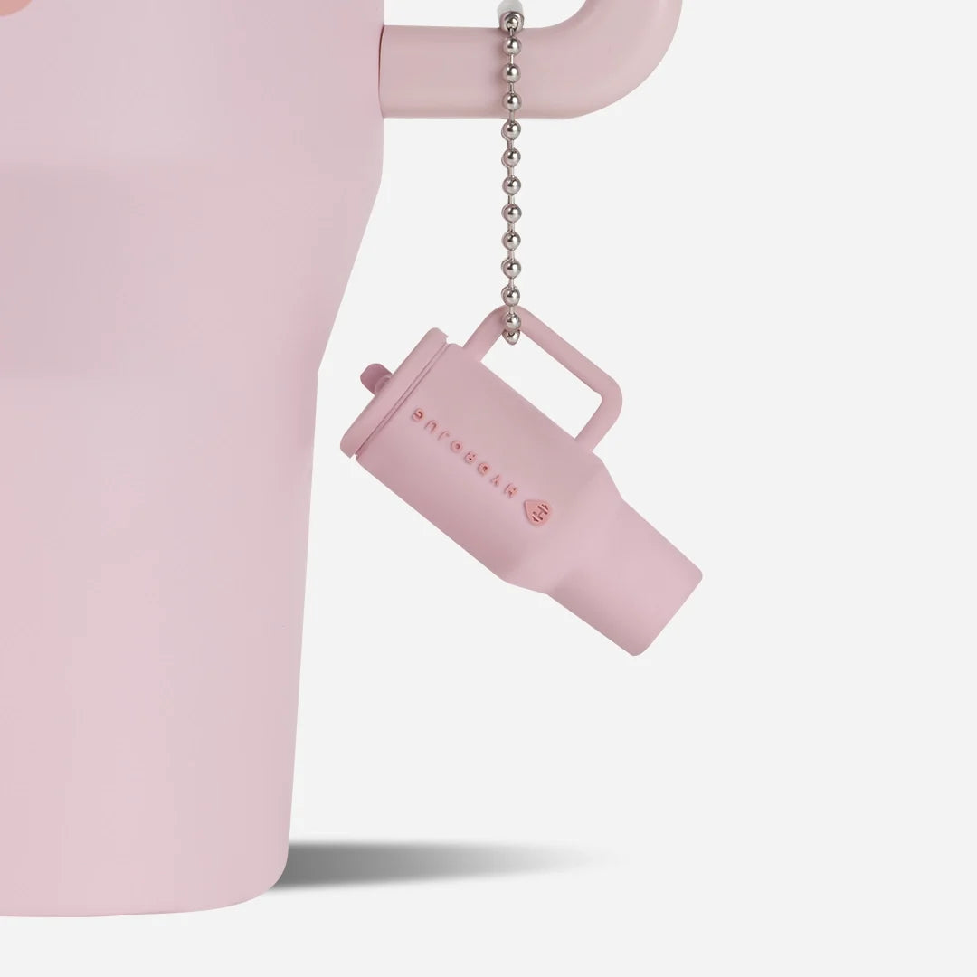 traveler-keychain-o1 Web-TravelerKeychainPhotos-PinkSand2.webp